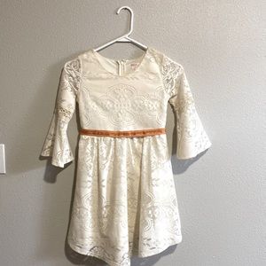 Fall lace dress with orange waist tie.